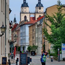 In the pedestrian area of Wittenberg with church St. Marien
